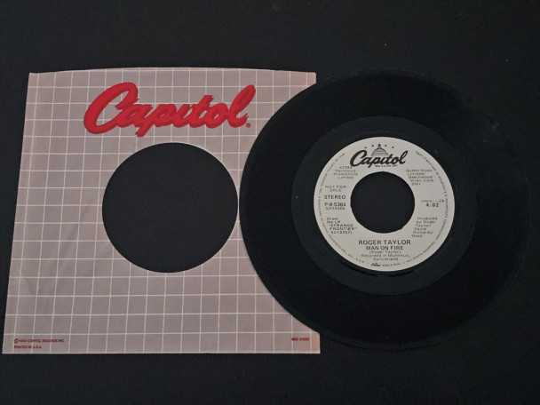 7" Vinyl single Roger Taylor Man on fire (USA) Promo (Queen) | Buy
