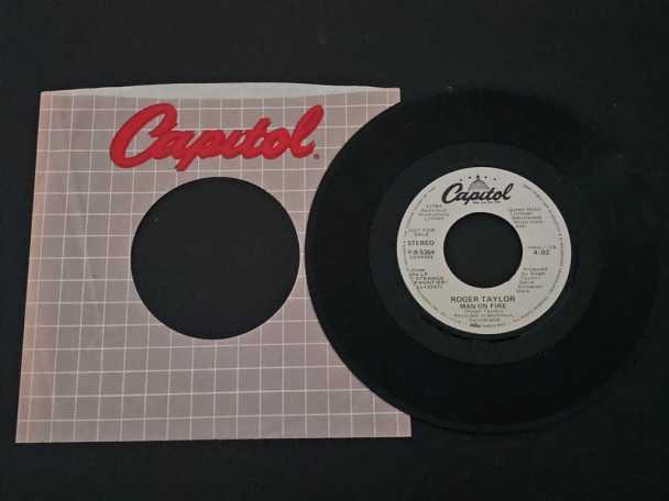 7" Vinyl single Roger Taylor Man on fire (USA) Promo (Queen) | Buy